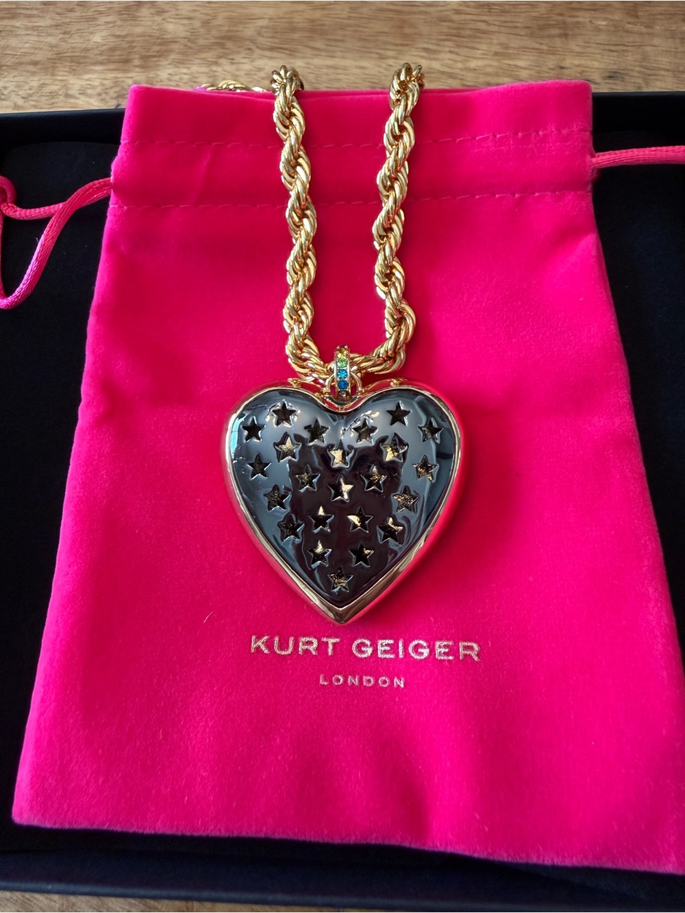 Kurt Geiger Gold-Tone Heart Necklace with Black Star Cutout Pendant